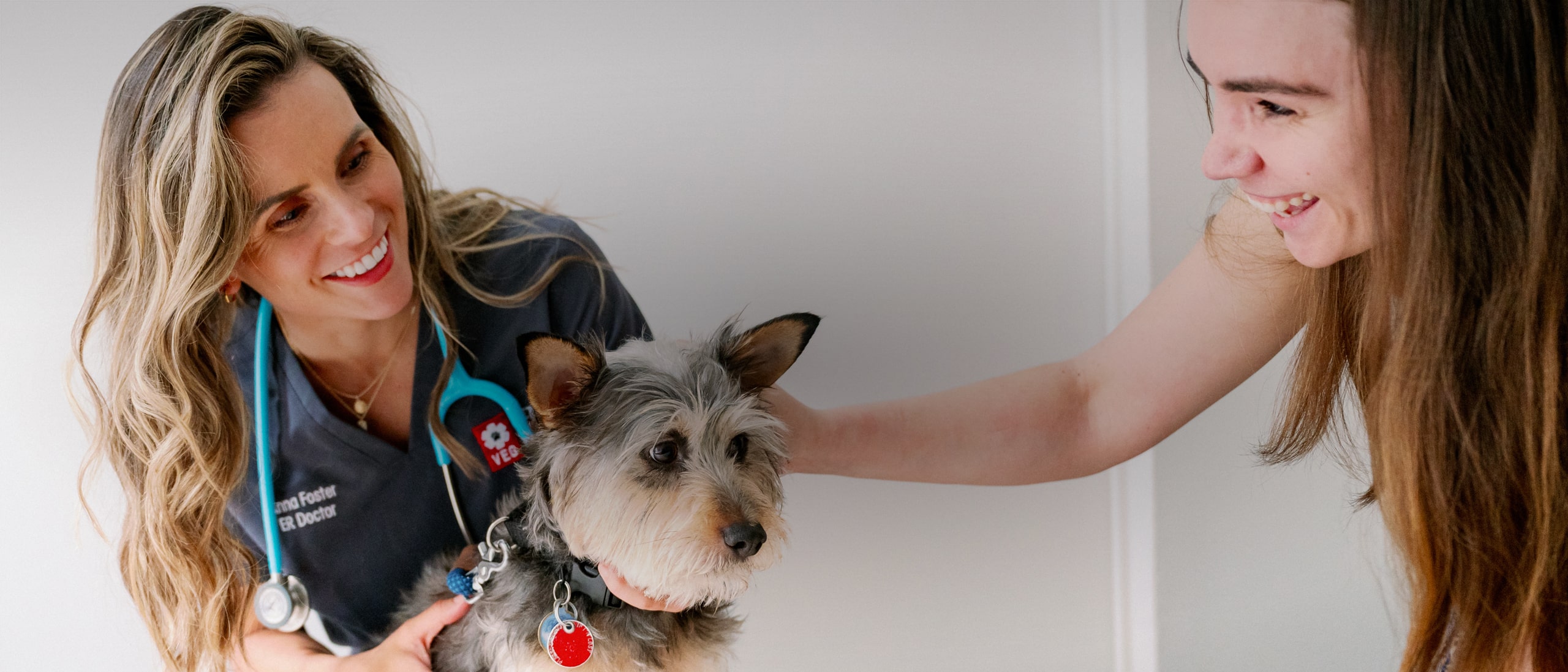 Anna with dog patient and owner